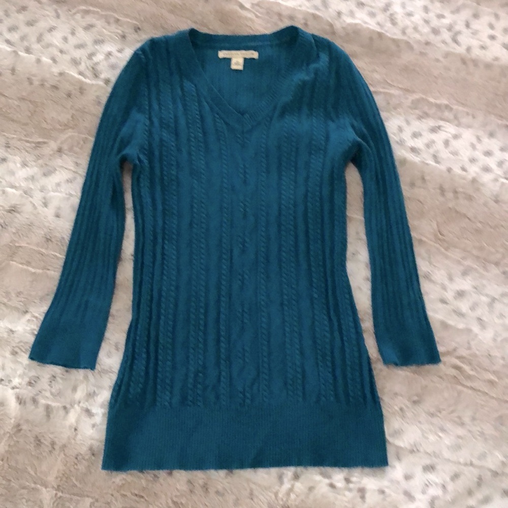 Dark teal color. Size medium. Fits slim.